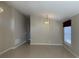 Living room with tile floors, high ceilings, and neutral colors at 5453 Shingle Creek Dr, Orlando, FL 32821