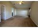 Large main bedroom with carpeted floors and an ensuite bathroom at 5453 Shingle Creek Dr, Orlando, FL 32821