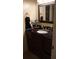 Bathroom with vanity, mirror, and granite countertop at 5850 Cypress Gardens Blvd # 304, Winter Haven, FL 33884