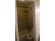 Clean bathroom with tile surround, shower, and bathtub at 5850 Cypress Gardens Blvd # 304, Winter Haven, FL 33884