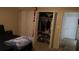 Bedroom with double doors closet and additional door at 5850 Cypress Gardens Blvd # 304, Winter Haven, FL 33884
