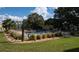 Clean community pool area with grassy lawn at 5850 Cypress Gardens Blvd # 304, Winter Haven, FL 33884