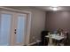 Simple dining area with a table and access to a patio at 5850 Cypress Gardens Blvd # 304, Winter Haven, FL 33884