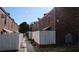 Brick building exterior with a walkway between units at 5850 Cypress Gardens Blvd # 304, Winter Haven, FL 33884