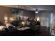 Spacious living room with sectional sofa and hardwood floors at 5850 Cypress Gardens Blvd # 304, Winter Haven, FL 33884