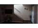 Indoor staircase leading to the upper level at 5850 Cypress Gardens Blvd # 304, Winter Haven, FL 33884