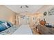 Spacious bedroom with a dresser, desk, and en-suite bathroom at 6110 Curry Ford Rd # 219, Orlando, FL 32822