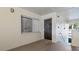 Private condo entry with dark brown door and tiled flooring at 6110 Curry Ford Rd # 219, Orlando, FL 32822