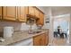 Well-equipped kitchen with granite countertops at 6110 Curry Ford Rd # 219, Orlando, FL 32822