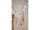 Bright kitchen with white appliances and wood cabinets at 6110 Curry Ford Rd # 219, Orlando, FL 32822