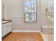 Bathroom with tiled floor, walk-in shower, and vanity at 839 Franconville Ct, Kissimmee, FL 34759