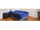 Small bedroom with a single bed and dark-colored nightstand at 839 Franconville Ct, Kissimmee, FL 34759