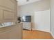 Bright bedroom with tile floors, built-in shelving, and double doors at 839 Franconville Ct, Kissimmee, FL 34759