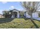 Single-story home with a large yard and screened garage at 839 Franconville Ct, Kissimmee, FL 34759