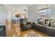 Spacious living room with comfy seating and a view of kitchen at 839 Franconville Ct, Kissimmee, FL 34759