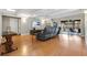 Living area with hardwood floors, comfy seating, and backyard access at 1660 Killean Ct, Apopka, FL 32712