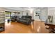 Spacious living room with hardwood floors and access to a patio at 1660 Killean Ct, Apopka, FL 32712