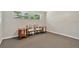 Bright office space with two chairs and window at 1660 Killean Ct, Apopka, FL 32712