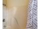 Updated bathtub and shower with a modern shower curtain at 2007 Disney Mgm Studio Ct, Kissimmee, FL 34746