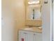 Small bathroom with a single sink and mirror at 2007 Disney Mgm Studio Ct, Kissimmee, FL 34746