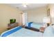 Guest bedroom with two twin beds and light blue bedding at 2007 Disney Mgm Studio Ct, Kissimmee, FL 34746