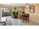 Dining area with a wooden table and access to patio at 2007 Disney Mgm Studio Ct, Kissimmee, FL 34746