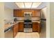 Updated kitchen with stainless steel appliances and granite countertops at 2007 Disney Mgm Studio Ct, Kissimmee, FL 34746