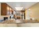 Kitchen with granite countertops and stainless steel appliances at 2007 Disney Mgm Studio Ct, Kissimmee, FL 34746