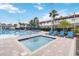 Community pool and spa with plenty of lounge chairs at 2007 Disney Mgm Studio Ct, Kissimmee, FL 34746