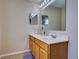 Bathroom with double vanity and a large mirror at 224 Fairfield Dr, Sanford, FL 32771