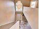 Grand entryway with tiled floors, chandelier, and open staircase at 224 Fairfield Dr, Sanford, FL 32771