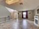 Open living area with tile floors and high ceilings at 224 Fairfield Dr, Sanford, FL 32771