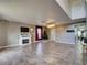 Spacious living room with tile floors, fireplace, and large windows at 224 Fairfield Dr, Sanford, FL 32771