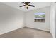 Bright bedroom with tile floors and ceiling fan at 2762 Hilda Cv, Winter Park, FL 32792