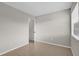 Bedroom with tile floors and access to a bathroom at 2762 Hilda Cv, Winter Park, FL 32792