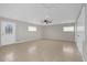 Bright bonus room featuring tile flooring and multiple closets at 2762 Hilda Cv, Winter Park, FL 32792
