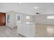 Updated kitchen, featuring white cabinets and an island at 2762 Hilda Cv, Winter Park, FL 32792
