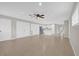 Open concept living area with kitchen and tile floors at 2762 Hilda Cv, Winter Park, FL 32792