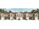 New townhome community with 5-unit building, 2-car garages, and neutral color palette at 2921 Hudson Hammock Way, Saint Cloud, FL 34773