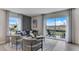 Open concept living room with sliding glass doors leading to patio at 2921 Hudson Hammock Way, Saint Cloud, FL 34773
