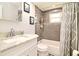 Clean bathroom with a bathtub and marble vanity at 3621 Falling Leaf Ln, Orlando, FL 32810