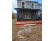 Fenced backyard with wooden deck and storage shed at 4530 Brook Hollow Cir, Winter Springs, FL 32708