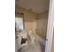 Bathroom with white bathtub, toilet, and vanity with a mirror at 4530 Brook Hollow Cir, Winter Springs, FL 32708