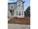 Two-story house with gray siding, landscaping, and a front entrance at 4530 Brook Hollow Cir, Winter Springs, FL 32708