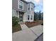 Two-story house with gray siding, landscaping, and a front entrance at 4530 Brook Hollow Cir, Winter Springs, FL 32708