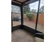 Screened porch overlooking a fenced backyard at 4530 Brook Hollow Cir, Winter Springs, FL 32708