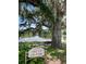 Tree of Life Park entrance with a scenic lake view at 533 Arena Dr, Davenport, FL 33837