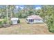 Large backyard with shed and screened porch at 5724 Se 2Nd St, Ocala, FL 34480