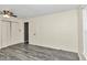 Spacious bedroom with ceiling fan and wood-look floors at 5724 Se 2Nd St, Ocala, FL 34480