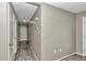 Clean and bright hallway with wood-look flooring at 5724 Se 2Nd St, Ocala, FL 34480
